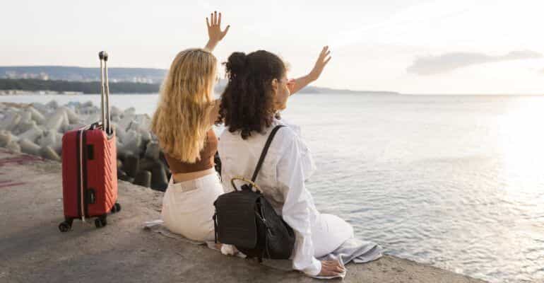 Full shot women with red baggage scaled 1 770x433 1